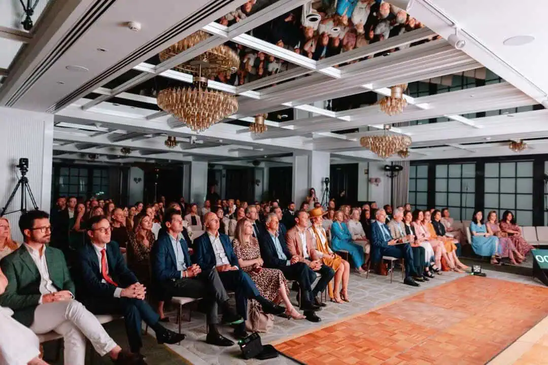 audience attending the spain cradle of conscious luxury event at rosewood villa magna hotel in madrid organized by cambio16 and featuring ark architects.