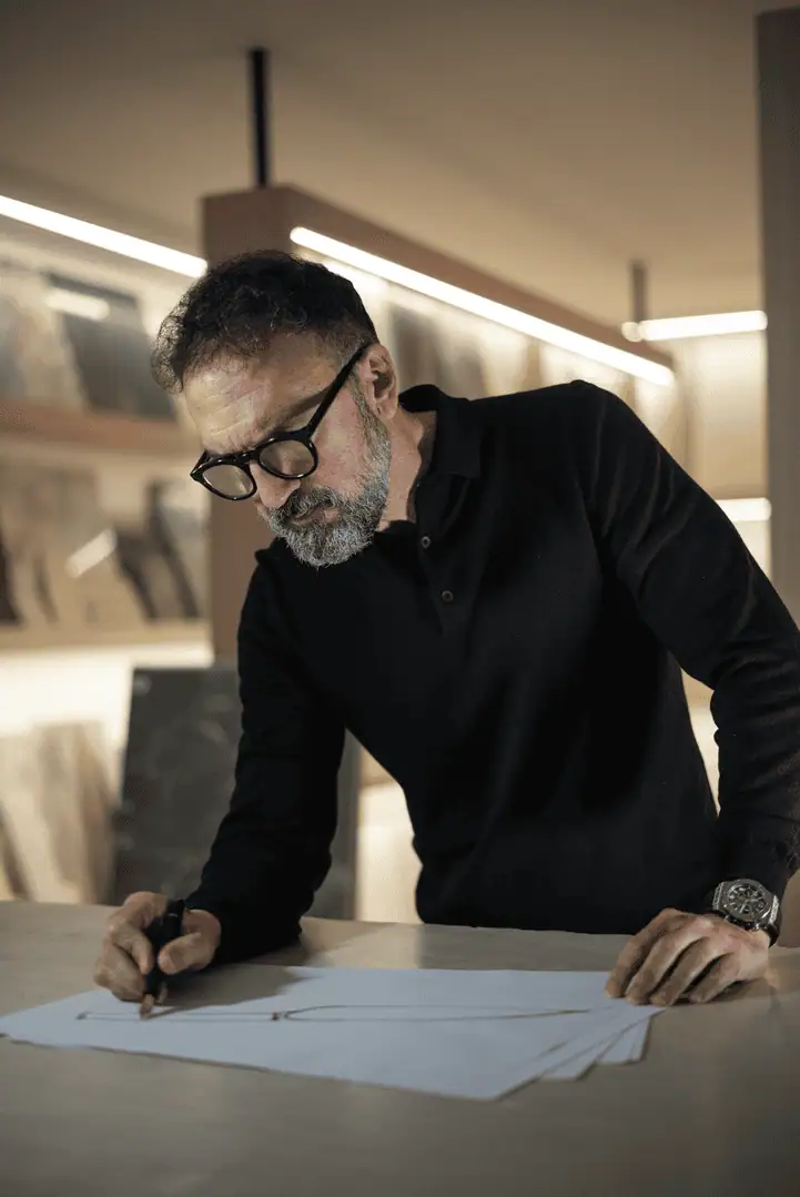 manuel ruiz moriche from ARK Architects sketching the outline of an artisan knife, illustrating the creative process where light, material, and emotion converge.