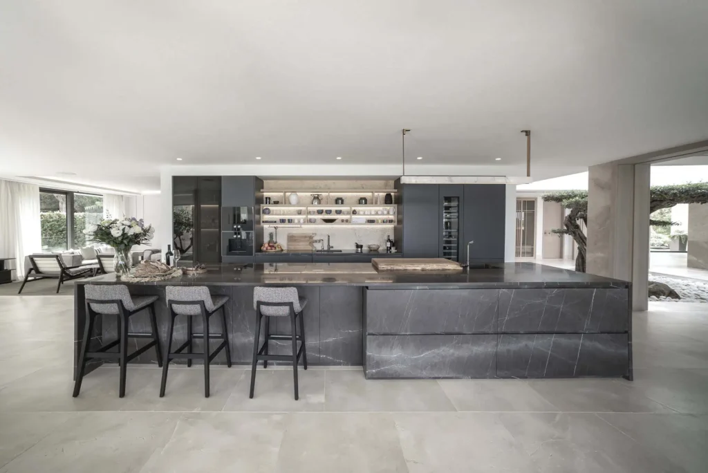 Spacious ARK Architects kitchen integrated with the living space, reflecting the kitchen as the heart of the home and a place to share experiences