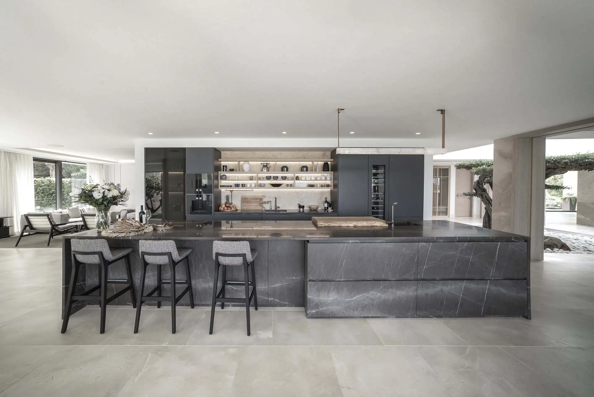 Spacious ARK Architects kitchen integrated with the living space, reflecting the kitchen as the heart of the home and a place to share experiences