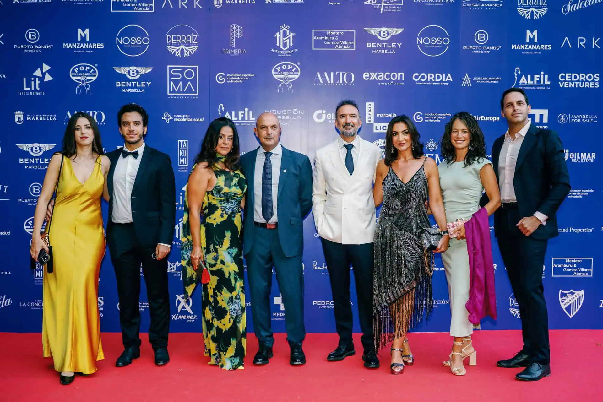 ARK Architects team in formal attire at AECC Marbella 40th Anniversary Gala